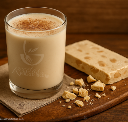 Coquito puertorriqueño navideño servido con turrón español crujiente en cocina rústica moderna.